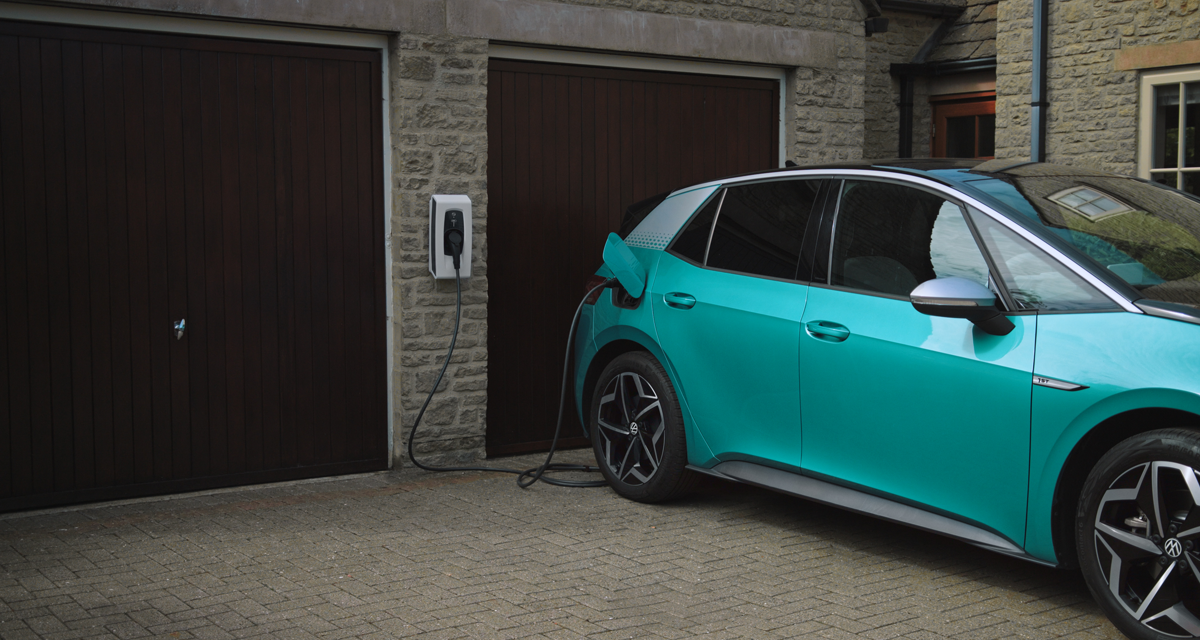 Car plugged into home EV charger