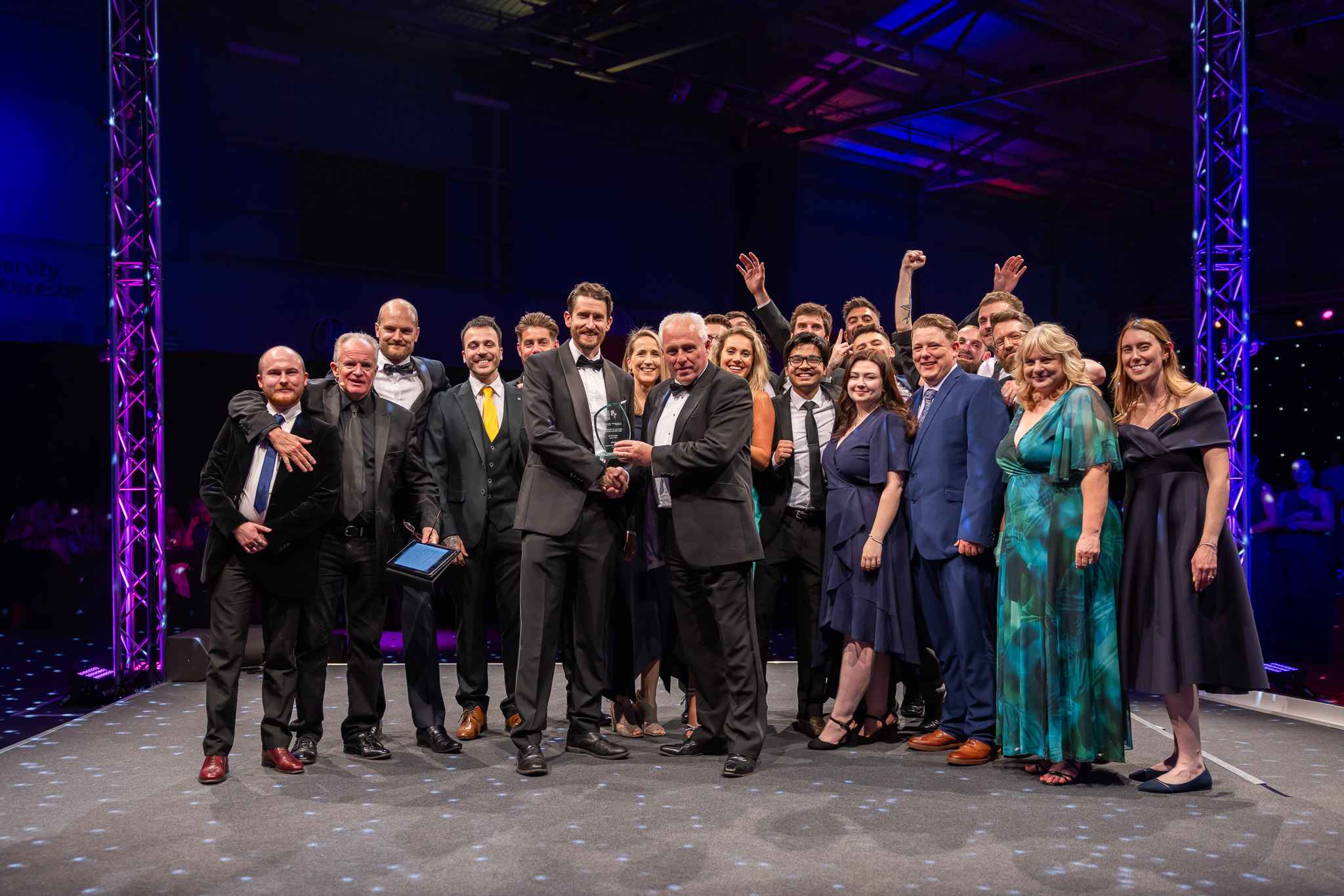 Indra staff onstage receiving the Best Use of Technology Award at the Hereford and Worcester Chamber of Commerce Awards 2024