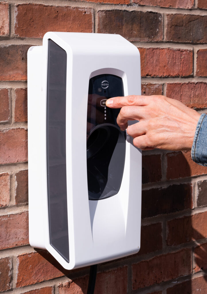 Person pressing the boost button on an Indra Smart PRO