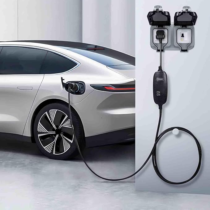 Silver car plugged into a standard 3-pin socket via an EV charging cable