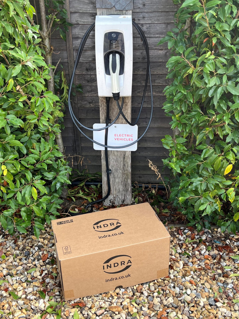 Indra LUX in box in front of post with older Indra PRO attached